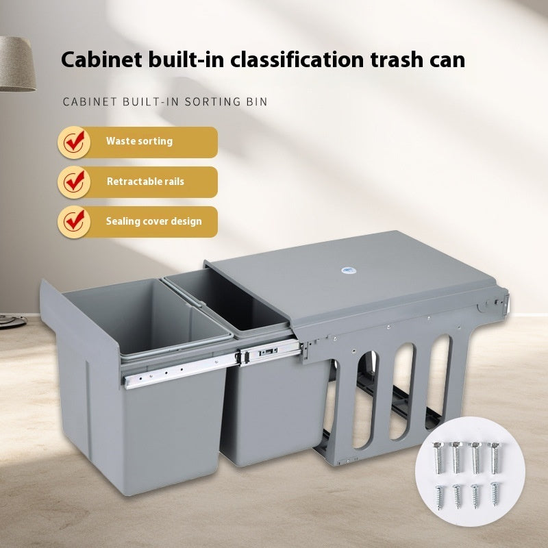 Pull-out kitchen bin hidden